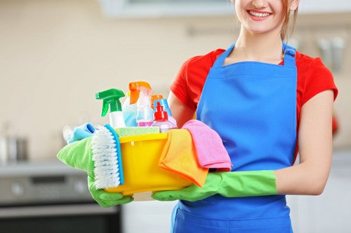 Carpet cleaning technician preparing safety equipment before a job